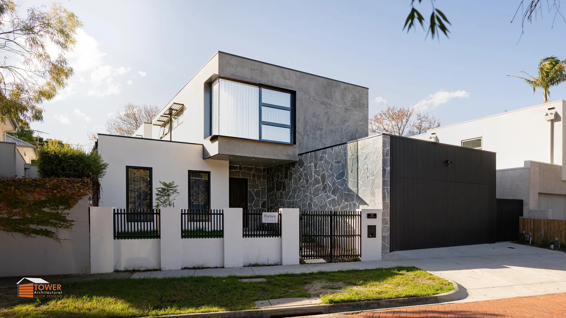 Architectural Range — Batten Series Location: Melbourne Builder: Fortier Style Profile: A bold, architectural expression shaped by strong vertical rhythm and refined minimalism.