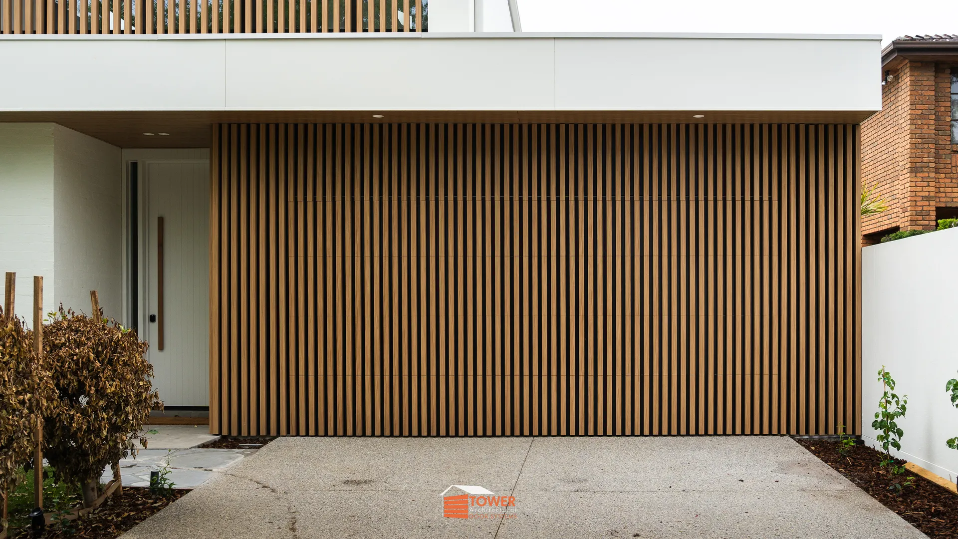 Architectural Range — Batten Series Location: Melbourne Style Profile: A warm and sophisticated façade defined by bold vertical structure and natural timber tones.