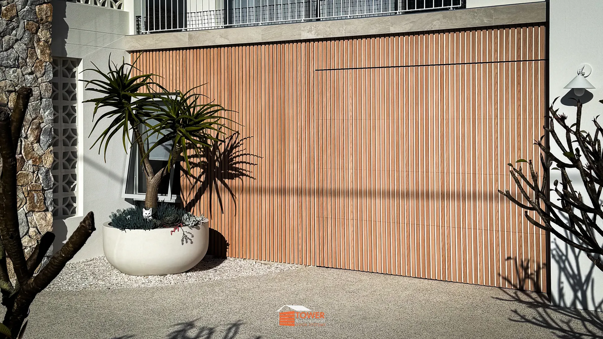 Architectural Range — Tower Batten Series Location: Bunbury, WA Style Profile: A warm, coastal-inspired façade featuring a Flushmount Pro system clad in 40 × 20 aluminium battens.