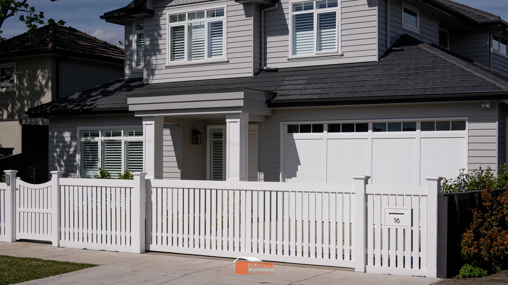 Architectural Range — Provincial Series Location: Melbourne Style Profile: A refined interpretation of classic provincial architecture, featuring a clean Textura White finish paired with precise V-Groove aluminium shiplap slats.